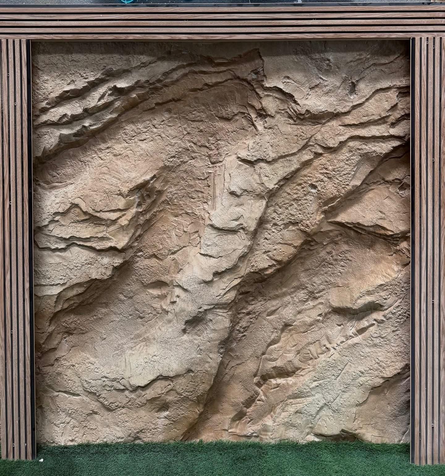 Stratified natural rock textured sculpted wall